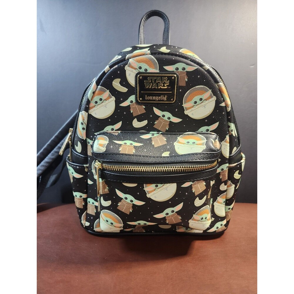Loungefly Star Wars Grogu All-Over Print Mini Backpack, featuring a playful...
